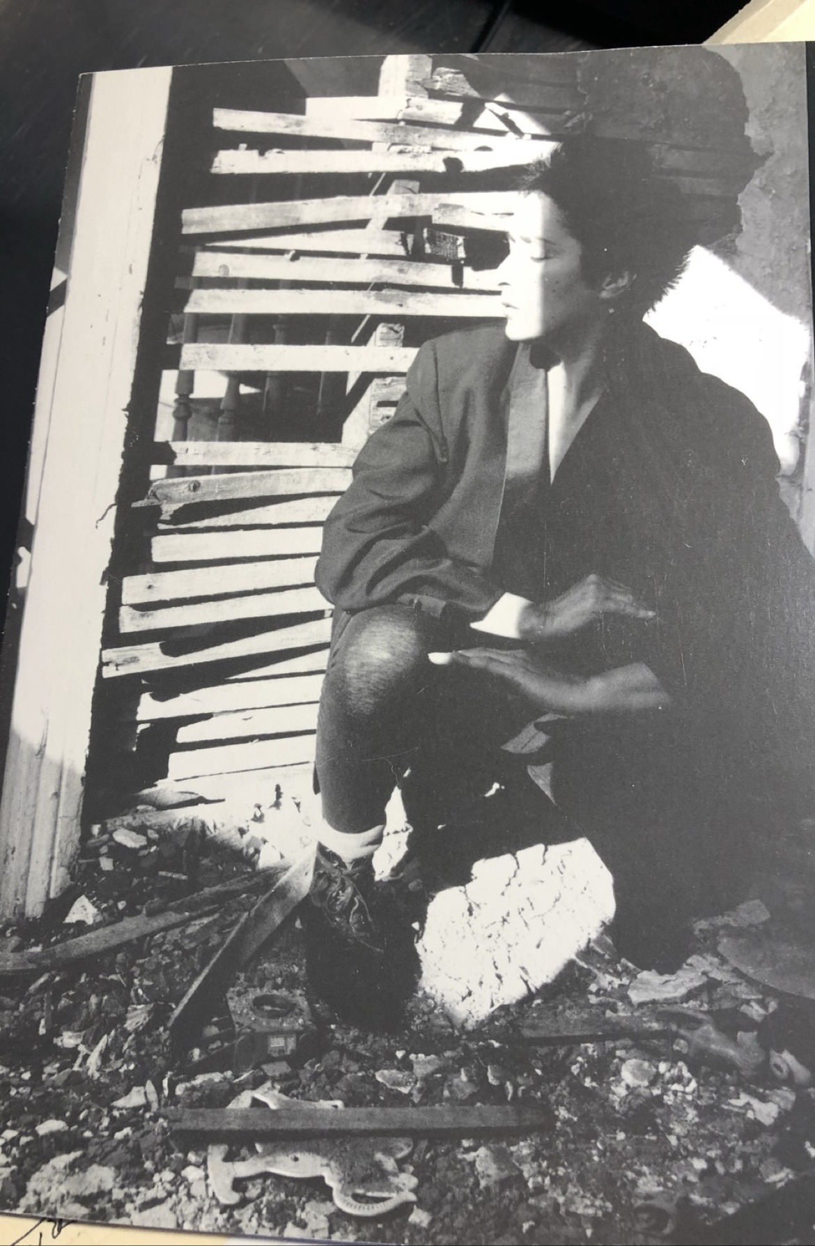 Brigitta Herrmann seated amid the ruins of a building in an early Ausdruckstanz Dance Theatre publicity portrait